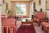 Family quad with sea view, balcony, private facilities (bath and shower), and breakfast